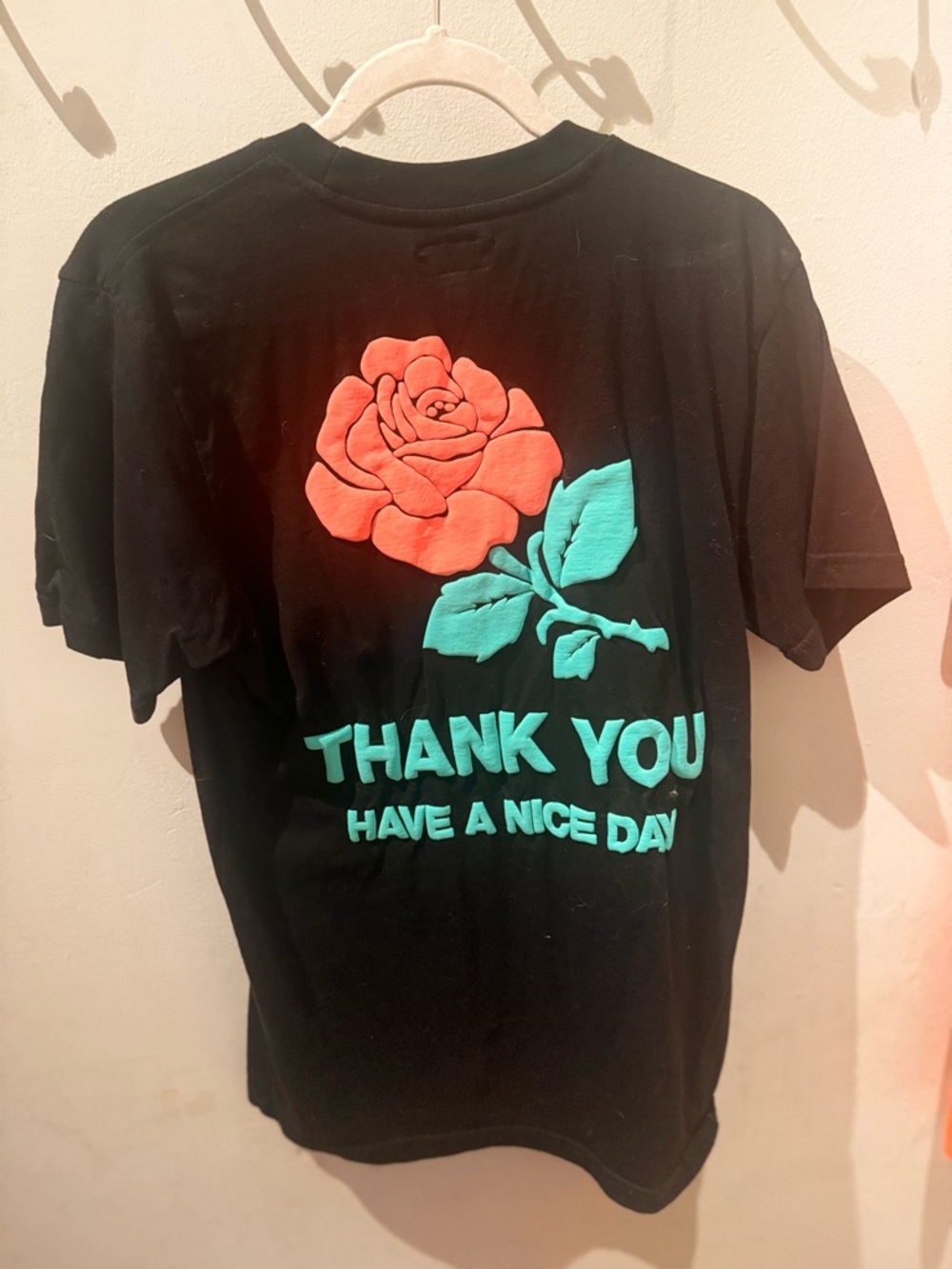 Black Graphic Tee with Coral Rose and Teal Text Puff Print - Unisex